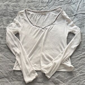 Super soft FP Movement by Free People Ivory Long Sleeve Top with Dark Trim